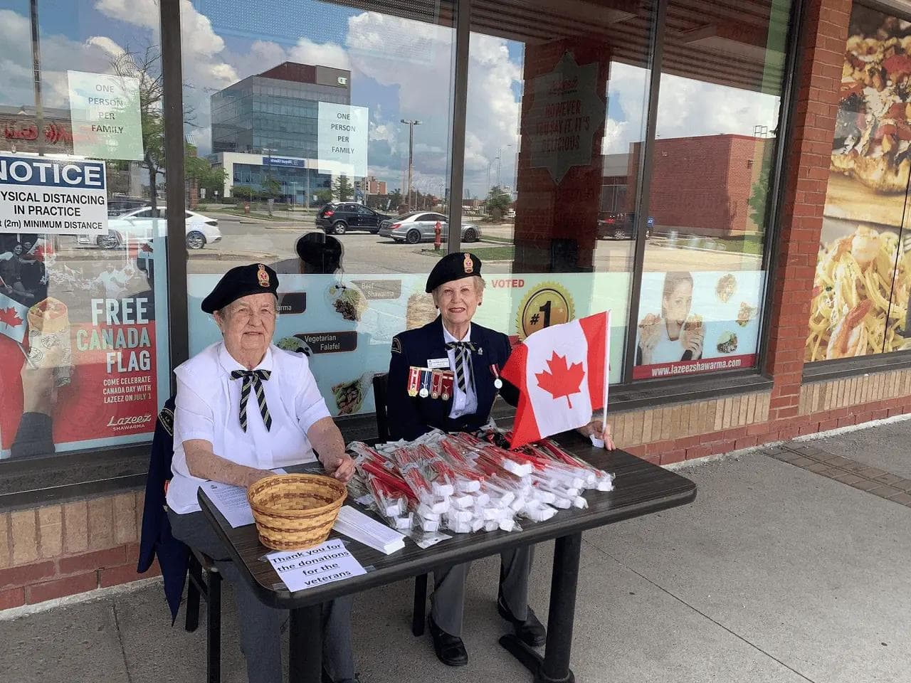 Lazeez Canada Day Celebration outside a lazeez location